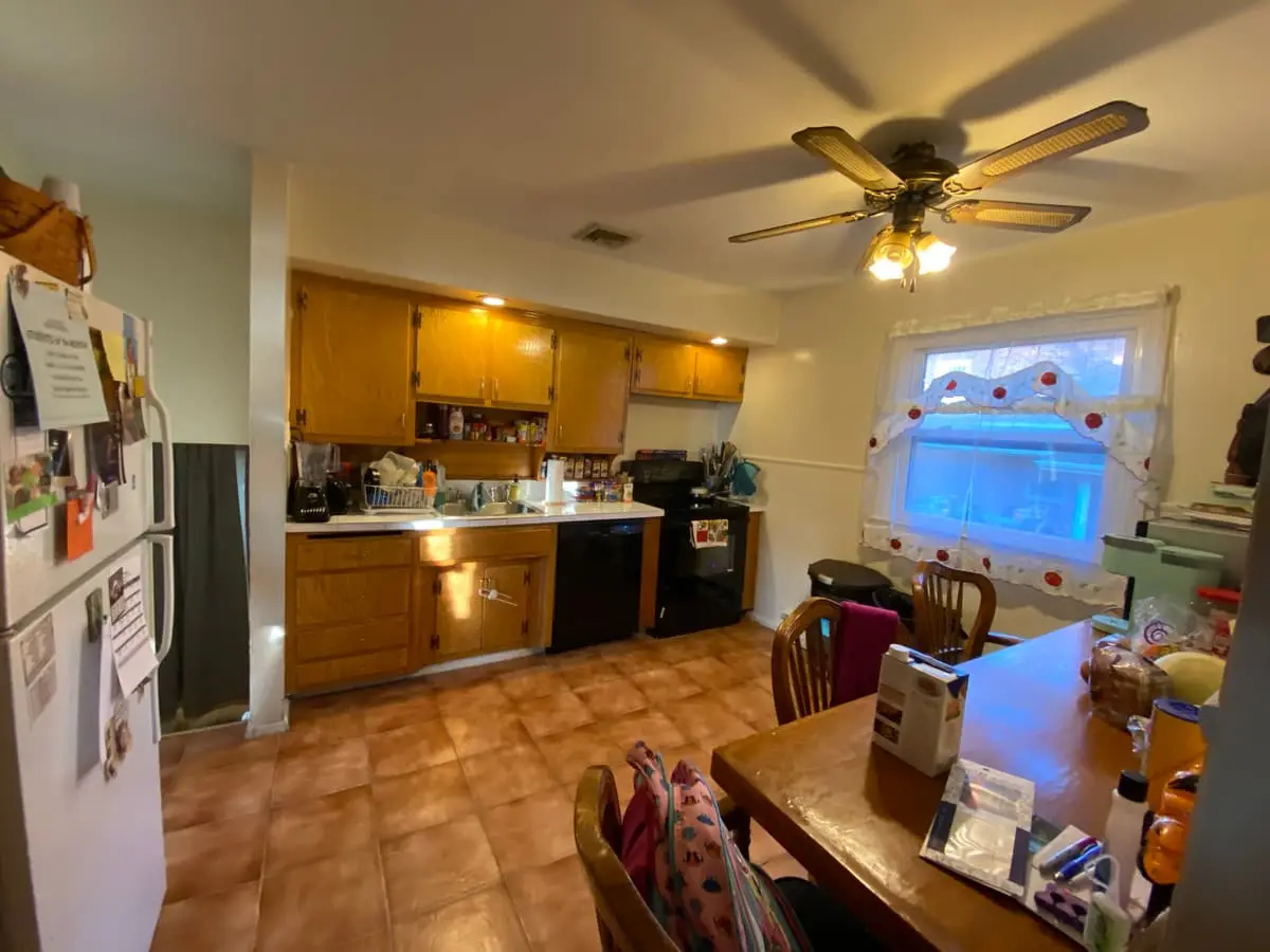 Selling in the Baldwin housing market: eat-in kitchen with wood cabinets and a tile floor